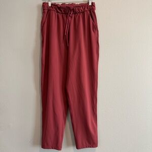 lululemon stretch high rise size 8 women’s maroon/burgundy 7/8 pants.